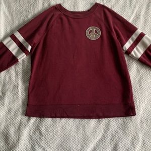 Maroon sweatshirt with a peace logo from Old navy. Size LG